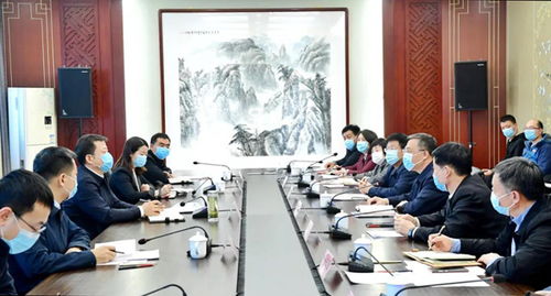 杨勤荣与山西文旅集团董事长王文保一行举行工作座谈会